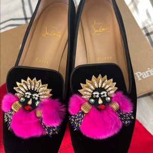 Christian Louboutin dark navy velvet loafer with grosgrain trim.